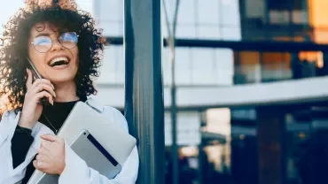 Young woman smiling on the phone