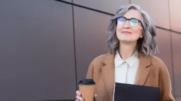 Over 50 worker with a coffee