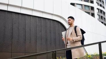 Young professional with a backpack