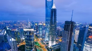 A city skyline illuminated at night.