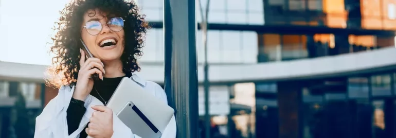 Young woman smiling on the phone