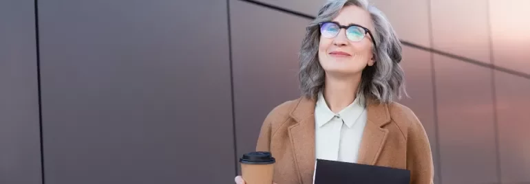 Over 50 worker with a coffee