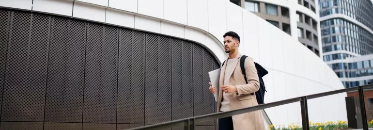 Young professional with a backpack