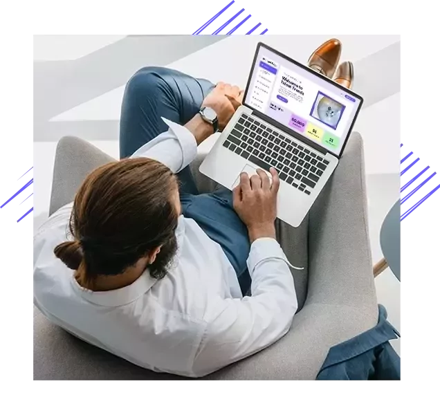 a man with a laptop using the Talent Trends tool